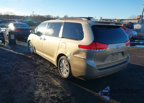 2011 Toyota Sienna Xle V6 z USA, uszkodzony, nr VIN 5TDYK3DC6BS004833